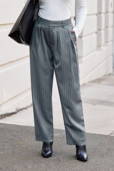 Step up your style with the Grey Pin-Striped Straight Leg Pants. These pants offer a sleek, professional look with their classic pin-stripe pattern and straight-leg fit. Perfect for the office or any occasion where you want to make a polished impression. Product code: CAA02D4G029SS Features:  Woven Straight leg Pattern: Stripes Wash Method: Regular Wash Material: 100%POLYESTER. Business Pants With Vertical Stripes And Straight Leg, Pinstripe Tapered Leg Business Casual Pants, Business Straight Pants With Vertical Stripes, Business Pants With Vertical Stripes, Straight Leg Pants With Vertical Stripes For Business, Straight Pants With Vertical Stripes For Business Casual, Pinstripe Trousers For Business Casual, Striped Straight Leg Business Pants, Pinstripe Straight Pants For Business Casual