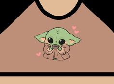 a baby yoda holding a cup with hearts on it