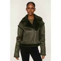 Green faux shearling (100% Polyester). Jacket. Long sleeves. Collar. Front zipper closure. 19" from shoulder to hemline. Imported. Fall Shearling Biker Jacket With Faux Fur Lining, Fall Biker Jacket With Faux Fur Lining And Shearling, Chic Biker Jacket With Faux Fur Lining, Winter Shearling Outerwear With Zipper Closure, Shearling Biker Jacket With Zipper Closure, Shearling Biker Jacket With Long Sleeves, Shearling Leather Jacket With Zip Fly For Fall, Faux Fur Leather Jacket With Zipper Closure, Shearling Biker Jacket With Faux Fur Lining