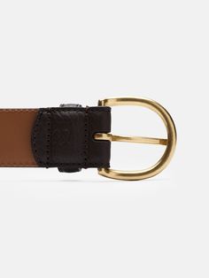 Our belts in grained leather offer a contemporary addition to your look. The buckle, made out of polished brass, adds flair whilst still presenting a sober and clean look, making it a great way to accessorize any outfit. Designer Leather Belt Buckles With Brass, Designer Leather Belt Buckles With Brass Buckle, Designer Leather Belt Buckle With Brass, Designer Formal Belts With Brass Hardware, Leather Workwear Belts With Brass Hardware, Leather Belts With Brass Hardware For Work, Luxury Leather Belt With Brass Hardware, Formal Leather Belt With Brass Buckle, Elegant Workwear Belts With Brass Hardware