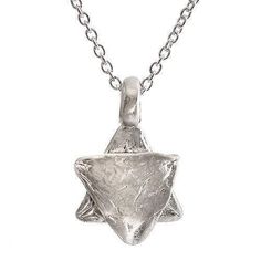 Description and Details Wear the Star of David close to your heart with this stunning, hand-sculpted pendant, which is imprinted with texture from stones of the Western Wall in Jerusalem. The sterling silver pendant hangs on a 16” traditional chain for a beautiful look that can be worn every day, or layered with your other favorite necklaces. Pendant size is 5/8″ (16mm) Chain length 16″ (42cm) SKU: HWN2A Jewish Necklace, Western Wall, Jewish Jewelry, Personalized Pendant, Star Of David, Silver Stars, Things To Buy, Sterling Silver Pendants, Silver Pendant