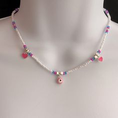 Gorgeous Brand New Trendy And Elegant Beaded Pink And Blue Tone Evil Eye Necklace With Silver Little Heart Charms And Ceramic Multicolored Beads. Adjustable Silver Chain In The Back. Great Quality And So Easy To Style Blue Tone, Evil Eye Necklace, Eye Necklace, Blue Tones, Heart Charm, Evil Eye, Womens Jewelry Necklace, Pink Ladies, Pink Blue