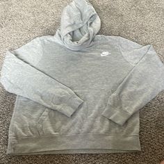 Great Condition! Brand New! Nike Grey Sweatshirt! Nike Athletic Heather Tops For Winter, Nike Athletic Heather Winter Tops, Nike Hooded Top For Loungewear, Nike Casual Hoodie Tops, Nike Gray Tops With Ribbed Cuffs, Nike Heather Grey Casual Sweatshirt, Nike Sweater Women, Gray Nike, Nike Sweaters