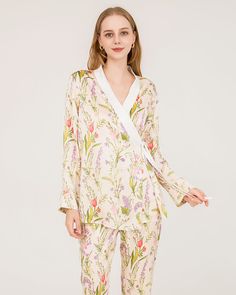 Type: Women's Silk Pajamas.Material:19 Momme 100% Luxury Mulberry Silk Details:Elevate your loungewear game with our luxurious silk pajama ensemble, designed to wrap you in elegance and coziness. Floral Elegance: Adorned with a charming floral print, our pajama set adds a touch of timeless beauty to your relaxation routine. Pure Silk Bliss: Crafted from the finest silk, our pajamas offer an indulgent, smooth feel against your skin. Experience the ultimate in luxury and comfort. Wrap-Style Top: T