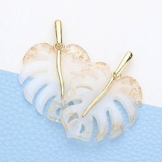 Earring Details: Size : 1.4" X 2" Post Back White Resin Pierced Earrings, Trendy White Resin Earrings, White Plastic Earrings For Parties, Trendy White Plastic Earrings, Trendy White Earrings, Modern White Resin Earrings, Trendy Acetate Earrings For Gifts, Tropical Leaf, Tropical Leaves