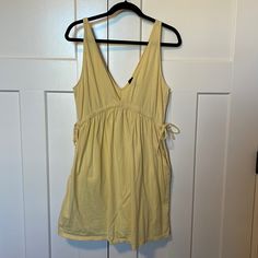 New Without Tags. Has Pockets. Ties On The Sides. Super Cute For Summer! Cotton V-neck Dress With Tie Back, V-neck Cotton Dress With Tie Back, Cotton V-neck Sundress For Brunch, V-neck Mini Dress With Tie Straps For Daywear, Cotton V-neck Sundress For Daywear, Cotton Mini Dress With Tie Waist, Cotton V-neck Mini Dress For Brunch, Cotton Mini Dress With Tie Waist For Day Out, Cotton Mini Dress With V-neck For Brunch