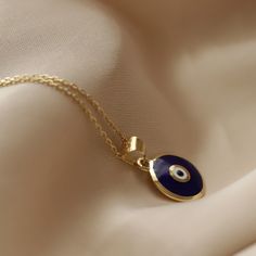 14K Real Solid Yellow Gold Enamel Evil Eye Minimalist Pendant Dark Blue-White Circle Design Chain Gift for Women Valentine's Day Dainty Various talismans have been used in many cultures to protect them from the harms of bad energy. The talisman used in most of the Eastern cultures is the evil eye. You can present the evil eye necklace to the people you want to be protected from the evil eye and your loved ones. ⓂMaterials & Specifications : Necklace Chain Length : 42 cm (16.5 in) 44 cm (17.3 Blue Enamel Round Pendant Necklace, Evil Eye Enamel Jewelry As A Gift, Evil Eye Enamel Jewelry Gift, Blue Pendant Necklace With Cable Chain, Blue Enamel Necklace With Polished Finish, Tarnish Resistant Enamel Jewelry Gift, Everyday Blue Tarnish-resistant Jewelry, Blue Round Pendant Necklace With Polished Finish, Blue 14k Gold Cable Chain Jewelry