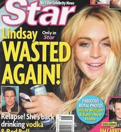 a magazine cover with a blonde woman holding a cell phone in her hand and smiling