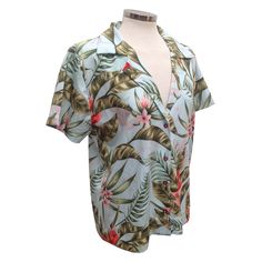 The perfect blouse for your summer resort vacation or casual summer wear around the house. Women's Tropical Print Shirt with Light Green & Coral Pink Flowers. Vibrant, full-color images of Ginger flowers on soft polyester poplin fabric. Comfortable and fitted short sleeve shirt with a notched lapel and button up front closure. * Hand Wash with Delicate Soap and Hang Dry * Made of soft 100% polyester LOOKING FOR MORE AMAZING GEAR? Follow us on Social Media for new releases, coupons and deals. Tropical V-neck Top For Summer, Hawaiian V-neck Top With Tropical Print, Summer V-neck Blouse With Tropical Print, Tropical V-neck Blouse For Beach, Summer V-neck Shirt For Vacation, Casual V-neck Camp Shirt For Summer, V-neck Tropical Print Blouse For Beach, Beachwear V-neck Tops With Tropical Print, Summer Printed Collared Tops