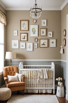 a baby's room with pictures on the wall and a crib in the corner