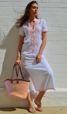 This Boho Kaftan Caftan is so cozy, it's definately idea for wearing during the weekend, or when you just want to relax at home. Although this caftan is really cozy, because the style is so elegant, it could be worn for an exotic night in, or when you want to wow your friends at your home party. Or wear it outdoors with boots, and look super bohemian! I live in London and in Marrakech. While I am in London, I always miss the exotic atmosphere of Marrakech. That's when I just bring out my comfy t Traditional V-neck Maxi Dress For Summer, Elegant Beach Tunic For Spring, Beach Wedding Dresses For Beach Season, Beach Season Wedding Dresses, Traditional V-neck Dress For Beach Season, White Long Maxi Dress For Summer, Elegant Short Sleeve Beach Dress For Vacation, White V-neck Dress For Resort, White Maxi Length Beachy Dress