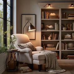 a living room filled with furniture and bookshelves next to a large open window