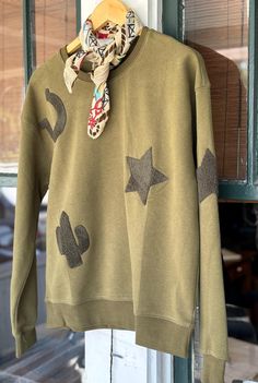 This may be the perfect sweatshirt!! Love the Olive Green Color! Screams Fall Western Style! True To Size! So soft + comfy! We will also have it available in tan soon!  Available: Small 2-4 Medium 6-8 Large 10-12 Patchwork Sweatshirt, Fort Pierce, Olive Green Color, Embroidered Sweatshirt, Ranch Style, Embroidered Sweatshirts, Sweatshirt Dress, Western Style, Rodeo