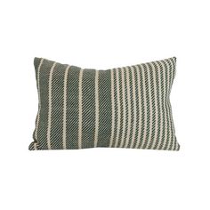 a black and white striped pillow on a white background