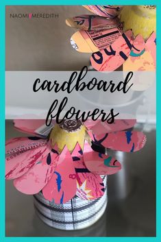 the words cardboard flowers are in front of a vase with paper flowers on it