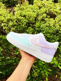 Walk into spring with style with our Air Force 1 Low Custom Shoes in Easter Pink Blue Lavender Pastel. Hand-painted with meticulous detail, these AF1 sneakers are a vibrant celebration of the season. Designed for comfort and style, they're perfect for adding a pop of color to any outfit. Elevate your footwear game with these exclusive kicks that capture the essence of Easter. Shop now and step into spring with style! Hand/spray painted pastel easter colors design. Resistant clear coat (protected against cracks and scratches). Custom made-to-order sneaker. Brand new 100% authentic Nike AF1 Low with box! Free shipping within the US territory! Need a different color? Let us know which color you're looking for and we'll find it for you. Have an idea for your custom painted sneakers? Please sen Pastel Shoes, Hand Spray, Painted Nikes, Painted Sneakers, Wedding Sneakers, Pastel Easter, Custom Air Force 1, Cute Nike Shoes, Blue Lavender