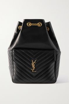 SAINT LAURENT's 'Joe' backpack is crafted from supple black leather with signature chevron quilting and topped with the 'YSL' monogram. Made in Italy, it's embellished with a chain-link drawstring. Keep your essentials stashed in the front pouch for easy access and the rest secured in the interior zipped pocket. Gucci Drawstring Backpack, Ysl Backpack, Hang Bags, Designer Backpack, Ysl Bags, Mini Mochila, Indie Jewelry, Hot Bags, Black Leather Backpack