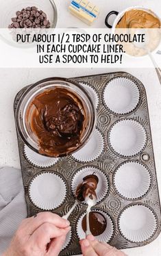 someone is dipping chocolate into cupcake liners and then adding them to muffin tins