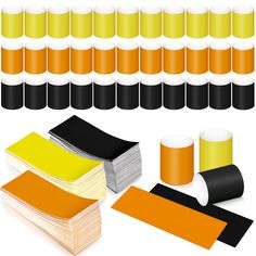 a set of different colored labels and stickers with black, yellow, orange, and white colors