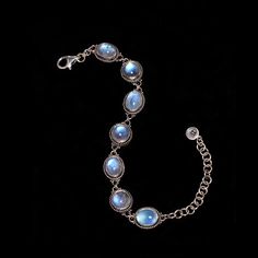 Sterling Silver Rainbow Moonstone bracelet, delicately designed & enhanced with opulent Moonstones, giving a sensual, feminine aura to this Elizabethan-inspired piece. Available in sizes 7 and 8. * Handcrafted in the finest .925 Sterling Silver. * Available in size 7:  6.5"-8" & size 8: 7"-9" * From my Mystic Moon Collection, featuring high-quality Rainbow Moonstones from India, fully-charged to enhance your intuition, provide protection & attract love. * Each natural gemstone is unique and may Elegant Moon Phase Bracelets, Elegant Moon Phase Bracelet, Elegant Silver Bracelets With Moon Phase, Elegant Crystal Bracelet With Natural Stones, Luxury Natural Stones Bracelets, Elegant Moon Phase Bracelet As A Gift, Elegant Silver Moon Phase Bracelet, Elegant Moon Phase Bracelet As Gift, Elegant Moon Phase Bracelet For Gift