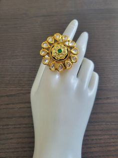 Bollywood designer kundan  ring  with gold plating are beautiful, elegent & will surely galvanize you, Adjustable Finger ring this Gold kundan ring looks beautiful  and elegant perfect for all occasion on any outfits you choose to wear (saree, salwar suits, lenga, etc.) *High quality craftsmanship 100% satisfaction guarantee  *Plated in Gold plating *adjustable finger ring *base metal for ring is copper *package include kundan ring *ready to ship from Houston TX United States GIFT- It comes in gift box perfect for gifting to your mom , sister, in laws, friends, on there birthday, wedding , bridal shower, anniversary, festival , and many more... Discover a variety of Necklace sets and Earring  only at Azzashiny.fj . our product are made from metal & alloys like Copper or Brass respectively. Indian Gold Ring, Wedding Jewelry Gold, Ring Indian, Gold Finger Rings, Gold Jewelry Gift, Kundan Jewelry, Gold Wedding Jewelry, Jewelry Indian, Jewelry Statement