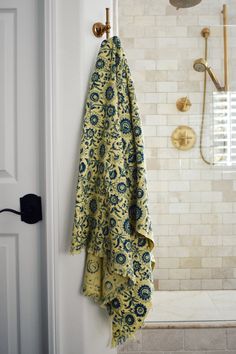 Block printed floral print waffle weave bath towel hanging on a hook Khadi Fabric, Floral Bath Towels, Green Bath Towels, Hand Towels Kitchen, Floral Bath, Storing Cookies, Towel Collection, Cotton Bath Towels, Block Printing