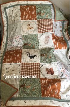 a baby quilt with animals on it