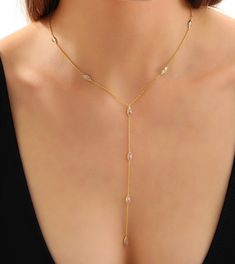 Lariat Necklace,14K Gold Minimalist Y Necklace,Long Necklace,Aesthetic Necklace,Layered Necklace,Christmas gifts,Birthday Gifts,Gift for Her Made of 925 Sterling Silver 14k Gold Filled Drop Zircon Stone Lariat,Y Necklace Enhance your style with this stunning lariat necklace, crafted from high-quality 925 sterling silver and plated in luxurious 14k gold. The delicate drop design features a sparkling zircon stone, adding a touch of timeless elegance and sophistication to any outfit. Whether you're Elegant Necklace With Delicate Chain And Long Drop, Elegant Long Drop Clavicle Chain Necklace, Formal Long Drop Necklaces With Delicate Chain, Formal Long Drop Necklace With Delicate Chain, Elegant Adjustable Length Chain Choker Necklace, Clavicle Chain Y-shape Drop Necklace, Elegant Adjustable Length Choker Chain Necklace, Adjustable Y-shape Clavicle Chain Drop Necklace, Elegant Lariat Charm Necklace With Chain