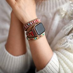 Boho Apple Watch Band Wrap Beaded Dress up your tech with this unique Apple Watch bracelet! Our wrap-around watchband is beautifully handcrafted using high-quality natural red jasper stones loomed on a natural brown cord. It comes with an adjustable closure to fit most wrist sizes. Refresh your smartwatch with these special beaded straps. Our boho watch band is the perfect gift for yourself, the independent, or the free-spirited. And of course, get the benefits of the natural stones while wearin Handmade Watch Bands, Apple Watch Sizes, Tiger Eye Jewelry, Rose Quartz Jewelry, Bracelet Apple Watch, Crystal Watches, Apple Watch Faces, 7 Chakras, Jasper Beads