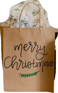 a brown paper bag with merry christmas written on it