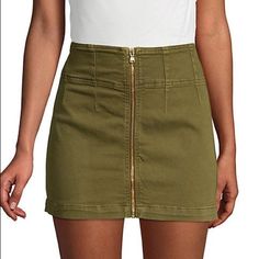 Size 24 Details A Denim Mini Skirt Offers A Refined, Elegant Style Into Any Ensemble. Fit: This Style Runs Large Sizing: 24=00, 25=0, 26=2, 27=4, 28=6, 29=8, 30=10, 31=10-12, 32=12 - Front Zip Closure - Denim Construction - Approx. 15.5" Length (Size 26) - Imported Fiber Content 93% Cotton, 5% Polyester, 2% Elastane Materials 2% Elastane 93% Cotton 5% Polyester Care Machine Wash Casual Denim Skirt With Zipper Closure, Casual Fitted Skirt With Zip Fly, Fitted Denim Skirt With Zipper Closure, Trendy Mini Length Bottoms With Zip Fly, Fitted Casual Denim Skirt With Zipper Closure, Casual Summer Skirt With Zipper Closure, Casual Fitted Denim Skirt With Zipper Closure, Casual Denim Skirt With Zip Fly, Spring Bottoms With Zip Fly And Mini Length