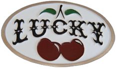 a lucky sign with two cherries on the front and one red apple on the back