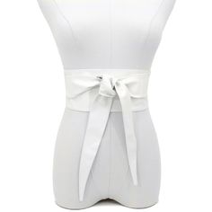 Indulge in the luxurious feel of our Obi Wrap Belt in White, crafted from buttery soft Italian leather. Made from premium Italian leather, this belt is smooth to the touch and designed to flatter your figure. The 3 3/4" width in the front gracefully tapers to a comfortable fit in the back, ensuring a stylish and secure look all day long. Unlike stiff belts that can dig in, this Italian leather belt conforms to your curves for ultimate comfort. Chic Belted Corset Belt For Spring, Leather Party Belts, Leather Corset Belt For Spring, Spring Leather Corset Belt, Chic Spring Corset Belt With Removable Feature, Chic Spring Corset Belt With Removable Belt, Chic Leather Corset Belt For Party, Chic Leather Corset Belt For Spring, Chic Spring Corset Belt With Belt Loops