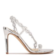 The Illusion dress sandal is all about glitz and glam. The sky high stiletto sandal is perfect for a night out on the town. It features translucent, jewel embellished, braided straps that climb from the toe to around the ankle. 3.98" stiletto heel Slip on closure faux leather upper, manmade sole Open and round toe Manmade, Faux Leather Spot Clean Imported Illusion Dress, Stiletto Sandals, Braided Strap, Glitz And Glam, Sky High, Dress Sandals, Stiletto Heel, Nine West, The Sky