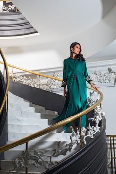 Green Embellished Silk Kaftan, Green Wedding Dress With Embroidered Sleeves, Elegant Green Kurta With Floral Embroidery, Green Long Sleeve Designer Kaftan, Designer Green Kurta With Embroidered Sleeves, Elegant Green Kurta With Embroidered Sleeves, Elegant Dress With Embroidered Sleeves And Traditional Drape, Elegant Green Kaftan For Festive Occasions, Elegant Floral Embroidered Kaftan For Evening