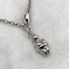 "We don't just want to tell you how beautiful this bracelet is, we want to show you. This Venus of Willendorf bracelet is handmade in sterling silver and features a beautiful carving that was estimated to have been carved 30,000 years ago! Venus charm measures 1.5cm in height. Available in 7\" and 8\" chain lengths. Can be fastened to any link in the chain. 925 Sterling Silver. Each piece is handmade to order in the Jewel Thief Brighton atelier." Carved Sterling Silver Bracelet, Symbolic Carved White Gold Jewelry, Carved White Gold Sterling Silver Jewelry, Adjustable Carved Sterling Silver Jewelry, Spiritual Carved Sterling Silver Jewelry, Carved Sterling Silver Jewelry Gift, Sterling Silver Carved Pendant Jewelry, Carved Sterling Silver Pendant Jewelry, Sterling Silver Spiritual Bracelet