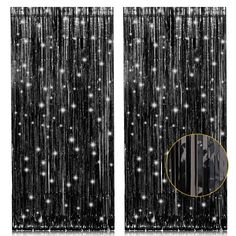 two black curtains with white and silver beads hanging from the side, one has a gold circle