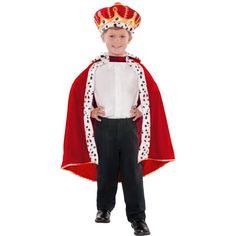 a little boy dressed in a king costume