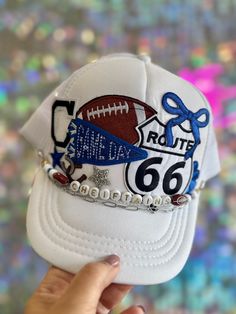 Get ready to cheer on the Sapulpa Cheiftains in style with our GameDay Trucker Hat! Made with authentic Route 66 flair, this hat is perfect for football fans and road trip enthusiasts alike. Add a touch of quirkiness to your game day outfit with our Sapulpa Cheiftains Route 66 Trucker Hat! White Trucker Baseball Cap For Fan Gear, White Snapback Trucker Hat For Winter, White Sports Fan Hat One Size Fits Most, Fun Cap For Game Day, Fun White Snapback Hat For Sports Events, White Fun Snapback Hat For Sports Events, White Sports Fan Hat For Game Day, White Sports Fan Hat For Sporting Events, White Trucker Baseball Cap For Fans