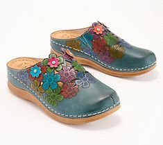 Flower power is back, and we can't get enough of it on these fab floral clogs. Boost your spring and summer wardrobe with this shoe that puts an extra spring in your step. From Spring Step. Spring Mules With Wooden Heel, Multicolor Slip-on Clogs For Spring, Spring Multicolor Closed Toe Mules, Multicolor Closed Toe Mules For Spring, Multicolor Leather Clogs For Spring, Spring Slip-on Mules With Wooden Heel, Spring Clogs With Wooden Flat Heel, Spring Flat Heel Clogs With Removable Insole, Spring Clogs With Removable Insole And Flat Heel