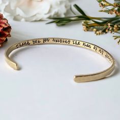 Thank you for raising the man of my dreams hand stamped bracelet gift for mother of the groom. Show your love and appreciation to the mother of the groom with this special secret message cuff bracelet. Comes in a gift box ready for gift giving.  Bracelet measurements: 1/8"x6"  Slightly adjustable for a custom fit. Bracelet is made from brass. Adjustable Name Bracelet With Engraving Option For Wedding, Meaningful Engraved Wedding Bracelets, Wedding Stamped Bangle Bracelet, Adjustable Hand Stamped Wedding Bracelets, Adjustable Hand Stamped Bracelets For Wedding, Adjustable Meaningful Bracelet For Wedding, Adjustable Meaningful Bracelets For Weddings, Hand Stamped Name Bracelet For Mother's Day Anniversary, Inspirational Hand Stamped Bracelets For Mother's Day