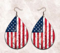 the american flag tear earrings are on display