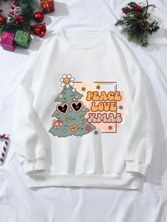 Introducing the Cozy Christmas Delight sweatshirt, featuring a festive Christmas tree pattern that will keep you comfortable and warm all season long. With its thermal lining, you can enjoy the holidays in cozy style. Order now and get ready to celebrate in comfort. Cozy Winter Holiday Sweatshirt, Casual Long Sleeve Holiday Sweatshirt, Christmas Sweater With Letter Print And Long Sleeves, Christmas Long Sleeve Sweater With Letter Print, Casual Holiday Sweatshirt With Graphic Print, Casual Graphic Print Sweatshirt For Holiday, Casual Graphic Print Holiday Sweatshirt, White Casual Sweatshirt For Holidays, Casual White Holiday Sweatshirt