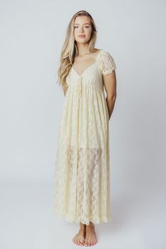 Slip on this maxi dress for an instantly-elevated outfit - the Lindsey is all lace and no fuss. We love its delicate vintage lace overlay, combined with a sweetheart neckline and puffed sleeves. It's a beautiful, feminine choice for any occasion! Available in two colorways. FIT: Runs true to size. MATERIAL: Self: 90% Nylon, 10% Spandex; Lining: 100% Rayon. GARMENT DETAILS: Lightweight maxi dress with an inverted empire waist silhouette. Features a low sweetheart neckline, ruffled short sleeves, and a self-tie ribbon accent at the bust. Finished with a flounced ruffled hem, and smocked back panel. Partially lined with mini-skirt length lining. SIZE GUIDE: S (2-4) / M (6-8) / L (10-12) MODEL DETAILS: Mackenzie - Size S Heather - Size S Molly - Size XL Our Brunette Misses Model Our Blonde Mis Tie Ribbon, Garment Details, Curve Model, Dress With Ruffles, Ruffle Shorts, Lace Maxi, Puffed Sleeves, Lace Maxi Dress, Lace Overlay