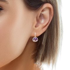 These stylish gemstone earrings feature beautiful amethysts weighing over 2 carats each. The amethysts are a delicate, lighter purple color, framed with sparkling diamond halos that make these earrings perfect for daytime or evening wear!! The "onion" shaped gems have a lovely outline that combines the sleek curves of a pear with the sparkle of a trilliant! Hand crafted in 18k rose gold with hinged level backs, these earrings measure 7/8" in length - a noticeable, yet elegant size! Add a fun pop Amethyst Drop Earrings Fine Jewelry, Elegant Amethyst Teardrop Earrings, Purple Teardrop Fine Jewelry Earrings, Amethyst Gemstone Drop Earrings With Accents, Faceted Amethyst Drop Earrings, Ring Pendant Necklace, Sparkle Diamonds, Smoky Quartz, Shades Of Purple