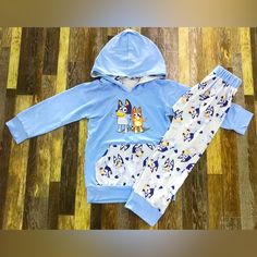 Bluey Jogger Outfit Brand New Ships Asap Sizes Available 3-6 Months, 6-12 Months, 12-18 Months, 2t, 3t, 4t, 5t, 6-7, 7-8. A Few Additional Sizes If Needed. Playful Light Blue Cartoon Print Sets, Cute Blue Playwear Sets, Blue Family Matching Sets For Playtime, Cute Blue School Sets, Playful Blue School Sets, Blue Cotton Playdate Sets, Playful Blue Sets For Playwear, Blue Cotton Play Sets, Cute Blue Sets For Playdate