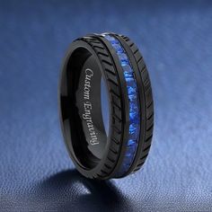 black ceramic ring with blue carbon fiber inlay