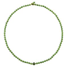 This is a brand new, handmade necklace created from very fine, highly translucent nephrite jade beads. Featuring a unique "button hole" clasp and a central focal-point bead, the nephrite from which this necklace was created is a step above the typical green nephrite seen in contemporary jewelry. The forrest-green color here is even throughout the 88 beads, each of them is highly translucent and the necklace simply radiates luminosity. The beads measure approximately 6mm and the large central bea Button Hole, Nephrite Jade, Jade Necklace, Jade Beads, Contemporary Jewelry, Handmade Necklace, Handmade Necklaces, Green Color, Focal Point