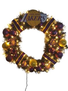 a christmas wreath with the los lakers logo on it