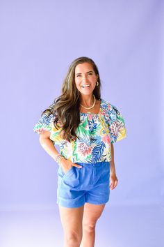 Add a touch of playfulness to your wardrobe with the Yvonne Printed Top. Featuring a unique square neck and puff sleeves, this top is perfect for pairing with denim or shorts. Embrace your fun and quirky side with this must-have piece! Product Details: Measurements: BUST- small 17.5" medium 18" large 18.5" Fabric: 100% Cotton printed elastic square neck slightly cropped puff sleeve model wearing size small model stats: size 4, 5'4 Spring Vacation Tops With Square Neck, Cotton Square Neck Top For Vacation, Square Neck Cotton Tops For Vacation, Cotton Tops With Square Neck For Vacation, Square Neck Tops For Summer Vacation, Blue Square Neck Top For Summer, Summer Square Neck Top For Day Out, Summer Tops With Square Neck For Day Out, Casual Square Neck Puff Sleeve Top For Summer